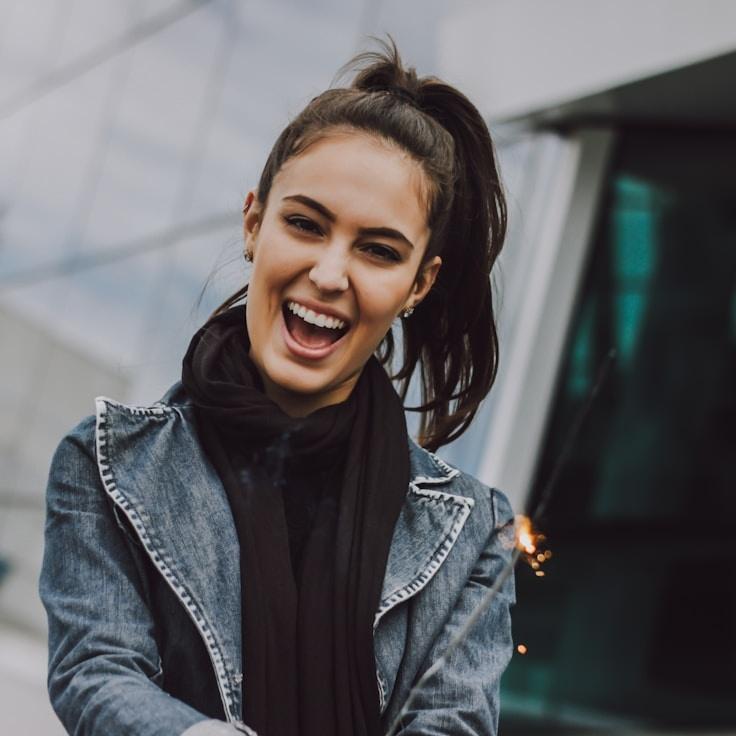 Portrait of Mira Chen, group coordinator and fusion cooking expert